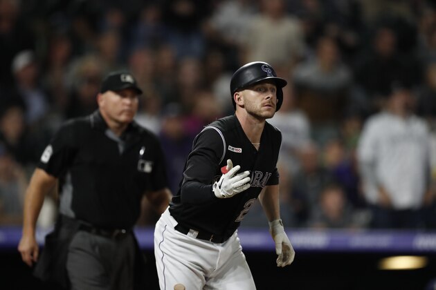Colorado Rockies shortstop Trevor Story (27) in the 10th inning of a baseball game Saturday, Sept. 28, 2019, in Denver. The Rockies won 3-2. (AP Photo/David Zalubowski)