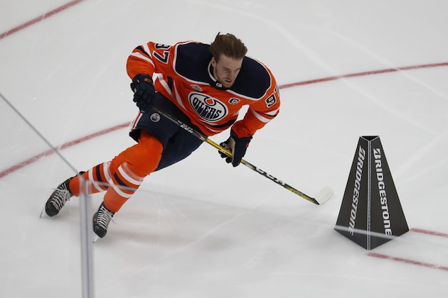 Edmonton Oilers forward Connor McDavid skates during the Skills Competition fastest skater contest, part of the NHL hockey All-Star weekend, Friday, Jan. 24, 2020, in St. Louis. (AP Photo/Jeff Roberson)