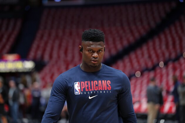 New Orleans Pelicans forward Zion Williamson warms up before an NBA basketball game San Antonio Spurs in New Orleans, Wednesday, Jan. 22, 2020. It is the first overall draft pick's regular season NBA debut after being injured since preseason. (AP Photo/Gerald Herbert)