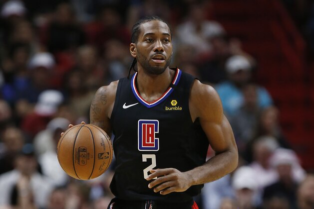 MIAMI, FLORIDA - JANUARY 24:  Kawhi Leonard #2 of the LA Clippers dribbles with the ball against the Miami Heat during the first half at American Airlines Arena on January 24, 2020 in Miami, Florida. NOTE TO USER: User expressly acknowledges and agrees that, by downloading and/or using this photograph, user is consenting to the terms and conditions of the Getty Images License Agreement.  (Photo by Michael Reaves/Getty Images)