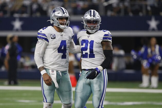 Dallas Cowboys quarterback Dak Prescott (4) and running back Ezekiel Elliott (21) during the second half of an NFL football game against the Washington Redskins in Arlington, Texas, Sunday, Dec. 15, 2019. (AP Photo/Ron Jenkins)