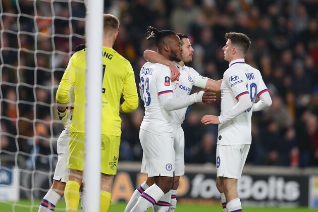 HULL, ENGLAND - JANUARY 25: Michy Batshuayi of Chelsea celebrates with teammates after scoring the first goal of his team during the FA Cup Fourth Round match between Hull City and Chelsea at KCOM Stadium on January 25, 2020 in Hull, England. (Photo by Ashley Allen/Getty Images)