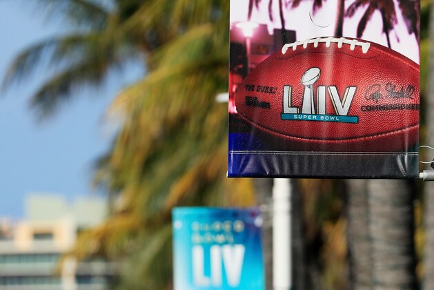 MIAMI BEACH, FLORIDA - JANUARY 24:  Banners for Super Bowl LIV are displayed along Ocean Drive in South Beach on January 24, 2020 in Miami Beach, Florida. The San Francisco 49ers will face the Kansas City Chiefs in the 54th playing of the Super Bowl, Sunday February 2nd.  (Photo by Cliff Hawkins/Getty Images)