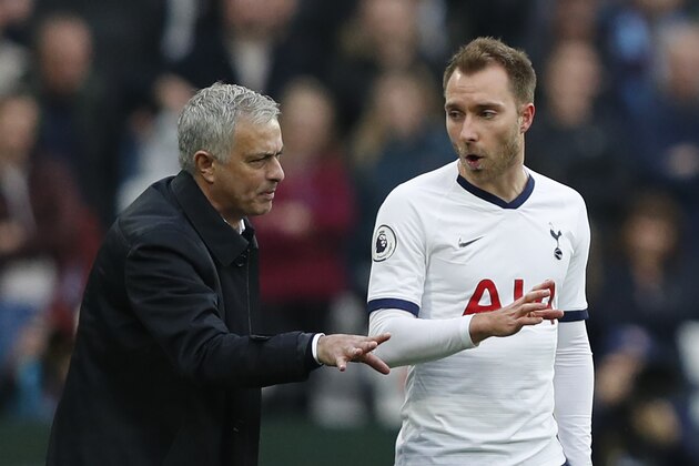 Tottenham Hotspur's Portuguese head coach Jose Mourinho (L) instructs Tottenham Hotspur's Danish midfielder Christian Eriksen as he comes on the field during the English Premier League football match between West Ham United and Tottenham Hotspur at The London Stadium, in east London on November 23, 2019. (Photo by Adrian DENNIS / AFP) / RESTRICTED TO EDITORIAL USE. No use with unauthorized audio, video, data, fixture lists, club/league logos or 'live' services. Online in-match use limited to 120 images. An additional 40 images may be used in extra time. No video emulation. Social media in-match use limited to 120 images. An additional 40 images may be used in extra time. No use in betting publications, games or single club/league/player publications. /  (Photo by ADRIAN DENNIS/AFP via Getty Images)