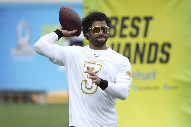 NFC quarterback Russell Wilson of the Seattle Seahawks is seen at the 2020 Pro Bowl Skills Showdown Wednesday, January 22, 2020, in Kissimmee, Fla. The event will be broadcast tomorrow at 9pm ET on ESPN. (AP Photo/Gregory Payan)