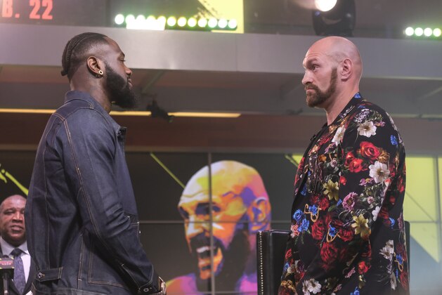 Boxers Deontay Wilder (L) and Tyson Fury (R) face-off during a press conference in Los Angeles, California on January 25, 2020, ahead of their re-match fight in Las Vegas on February 22. (Photo by RINGO CHIU / AFP) (Photo by RINGO CHIU/AFP via Getty Images)