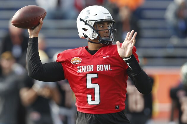 Utah State's Jordan Love throws a pass as the North squad runs drills during practice for the Senior Bowl Wednesday, Jan. 22, 2020, in Mobile, Ala. (AP Photo/Butch Dill)