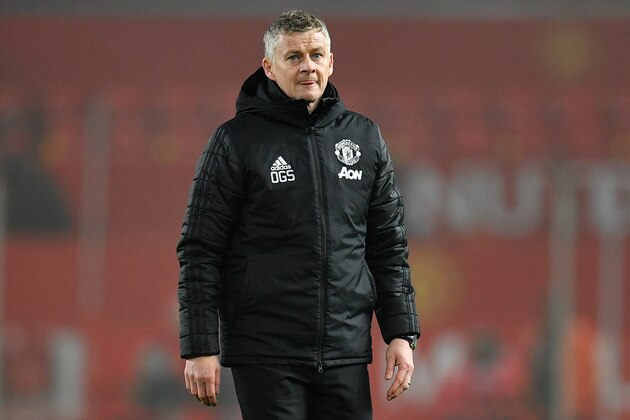 Manchester United's Norwegian manager Ole Gunnar Solskjaer leaves the pitch after the English Premier League football match between Manchester United and Burnley at Old Trafford in Manchester, north west England, on January 22, 2020. - Burnley won the match 2-0. (Photo by Paul ELLIS / AFP) / RESTRICTED TO EDITORIAL USE. No use with unauthorized audio, video, data, fixture lists, club/league logos or 'live' services. Online in-match use limited to 120 images. An additional 40 images may be used in extra time. No video emulation. Social media in-match use limited to 120 images. An additional 40 images may be used in extra time. No use in betting publications, games or single club/league/player publications. /  (Photo by PAUL ELLIS/AFP via Getty Images)