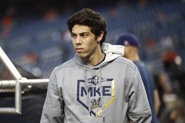 Milwaukee Brewers' Christian Yelich walks on the field during batting practice before a National League wild card baseball game against the Washington Nationals, Tuesday, Oct. 1, 2019, in Washington. (AP Photo/Patrick Semansky)