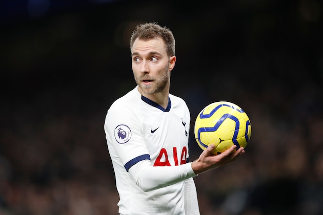 Tottenham Hotspur's Danish midfielder Christian Eriksen holds the ball during the English Premier League football match between Tottenham Hotspur and Norwich City at the Tottenham Hotspur Stadium in London, on January 22, 2020. (Photo by Adrian DENNIS / AFP) / RESTRICTED TO EDITORIAL USE. No use with unauthorized audio, video, data, fixture lists, club/league logos or 'live' services. Online in-match use limited to 120 images. An additional 40 images may be used in extra time. No video emulation. Social media in-match use limited to 120 images. An additional 40 images may be used in extra time. No use in betting publications, games or single club/league/player publications. /  (Photo by ADRIAN DENNIS/AFP via Getty Images)