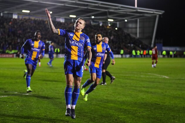 SHREWSBURY, ENGLAND - JANUARY 26:  Jason Cummings of Shrewsbury Town celebrates after scoring a goal to make it 1-2 during the FA Cup Fourth Round match between Shrewsbury Town and Liverpool at New Meadow on January 26, 2020 in Shrewsbury, England. (Photo by James Baylis - AMA/Getty Images)