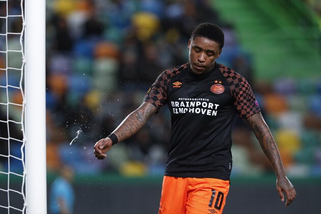 PSV's Steven Bergwijn spits during the Europa League group D soccer match between Sporting CP and PSV Eindhoven at the Alvalade stadium in Lisbon, Thursday, Nov. 28, 2019. (AP Photo/Armando Franca)