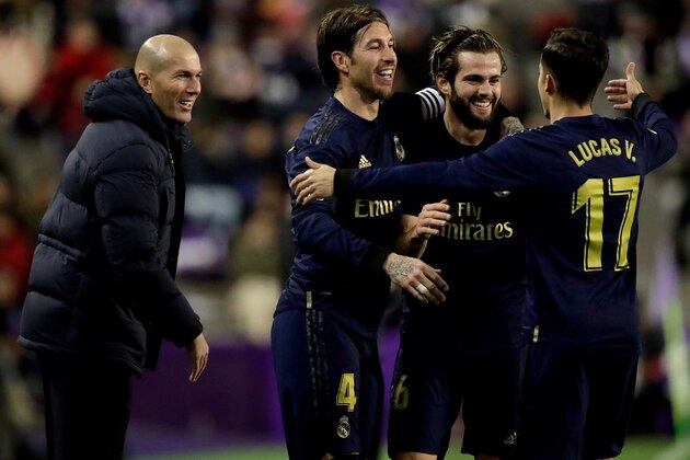 VALLADOLID, SPAIN - JANUARY 26: (L-R) coach Zinedine Zidane of Real Madrid, Sergio Ramos of Real Madrid, Nacho of Real Madrid, Lucas Vazquez of Real Madrid celebrate goal during the La Liga Santander  match between Real Valladolid v Real Madrid at the Stadium Jose Zorrilla on January 26, 2020 in Valladolid Spain (Photo by David S. Bustamante/Soccrates/Getty Images)