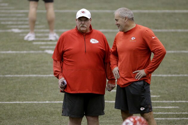 Kansas City Chiefs head coach Andy Reid and special teams coach David Toub watch an NFL football practice Thursday, Jan. 23, 2020 at in Kansas City, Mo. The Chiefs will face the San Francisco 49ers in Super Bowl 54. (AP Photo/Charlie Riedel)