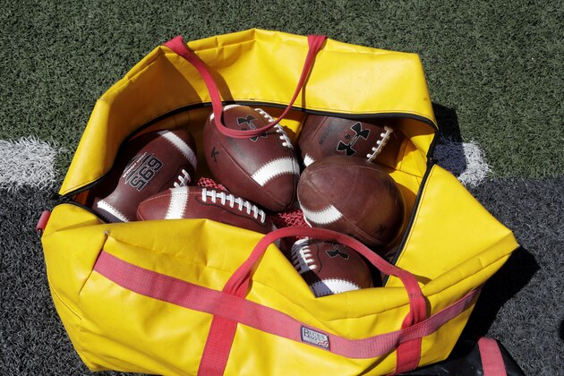 Kicking footballs are seen in a bag during the first half of an NCAA college football game between Maryland and Howard, Saturday, Aug. 31, 2019, in College Park, Md. (AP Photo/Julio Cortez)