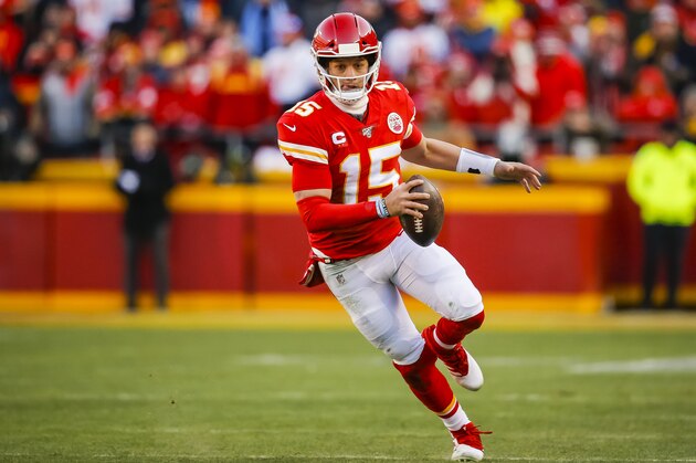 KANSAS CITY, MO - JANUARY 19: Patrick Mahomes #15 of the Kansas City Chiefs runs with the football in the second quarter of the AFC Championship game against the Tennessee Titans at Arrowhead Stadium on January 19, 2020 in Kansas City, Missouri. (Photo by David Eulitt/Getty Images)
