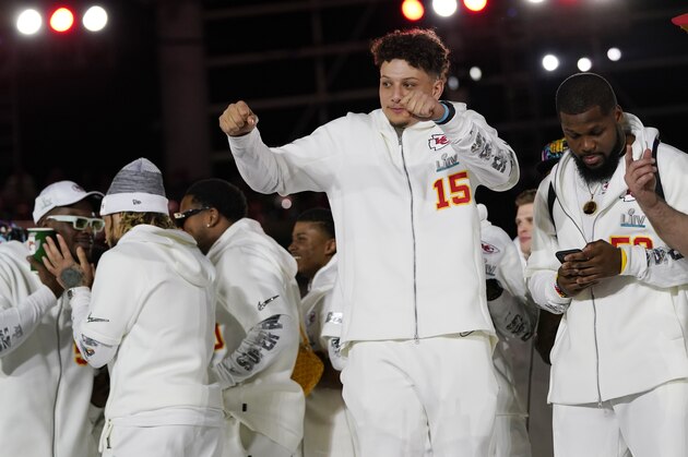 Kansas City Chiefs Patrick Mahomes arrives with his teammates for Opening Night for the NFL Super Bowl 54 football game Monday, Jan. 27, 2020, at Marlins Park in Miami. (AP Photo/David J. Phillip)