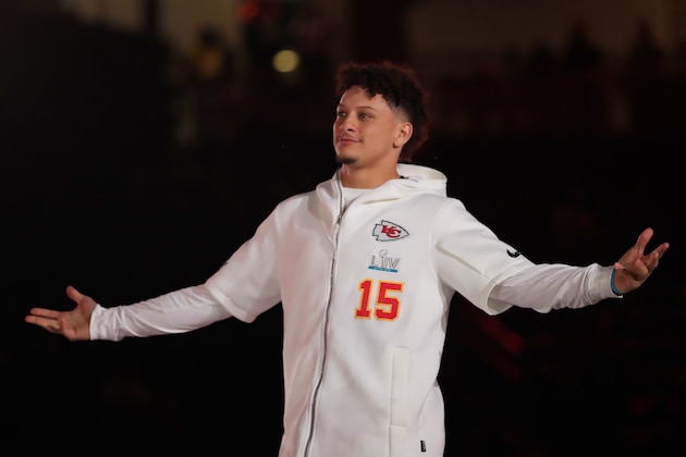 MIAMI, FLORIDA - JANUARY 27: Quarterback Patrick Mahomes #15 of the Kansas City Chiefs makes his entrance to Super Bowl Opening Night presented by BOLT24 at Marlins Park on January 27, 2020 in Miami, Florida. (Photo by Cliff Hawkins/Getty Images)