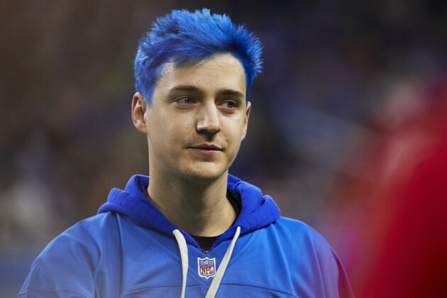 Richard Tyler Blevins, better known by his online alias Ninja during pregame of an NFL football game between the Detroit Lions and the New York Giants , Sunday, Oct. 27, 2019, in Detroit. (AP Images/Rick Osentoski)