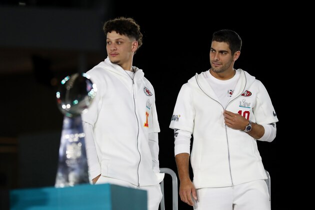 MIAMI, FLORIDA - JANUARY 27: Quarterback Patrick Mahomes #15 of the Kansas City Chiefs and quarterback Jimmy Garoppolo #10 of the San Francisco 49ers take part in Super Bowl Opening Night presented by BOLT24 at Marlins Park on January 27, 2020 in Miami, Florida. (Photo by Michael Reaves/Getty Images) MIAMI, FLORIDA - JANUARY 27: Quarterback Patrick Mahomes #15 of the Kansas City Chiefs and quarterback Jimmy Garoppolo #10 of the San Francisco 49ers take part in Super Bowl Opening Night presented by BOLT24 at Marlins Park on January 27, 2020 in Miami, Florida. (Photo by Michael Reaves/Getty Images)