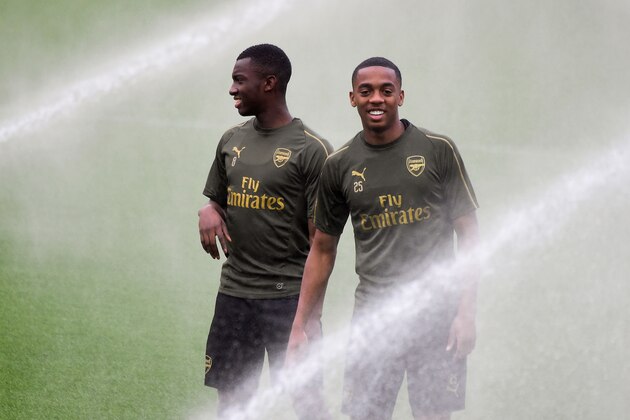 Arsenal's English midfielder Joe Willock (R) and Arsenal's English forward Eddie Nketiah attend a training session at the Mestalla stadium in Valencia on May 8, 2019 on the eve of the UEFA Europa League semi-final second leg football match between Valencia and Arsenal. (Photo by JOSE JORDAN / AFP)        (Photo credit should read JOSE JORDAN/AFP via Getty Images)