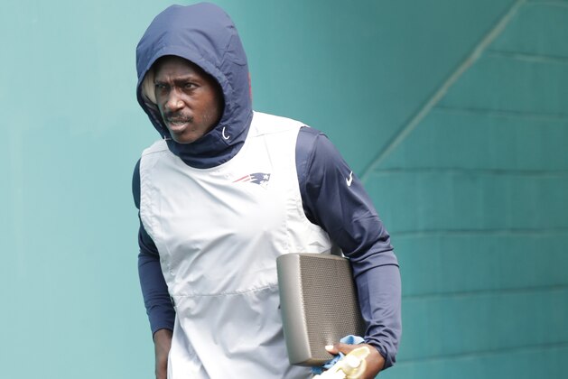 New England Patriots wide receiver Antonio Brown enters the field before an NFL football game against the Miami Dolphins, Sunday, Sept. 15, 2019, in Miami Gardens, Fla. (AP Photo/Lynne Sladky)