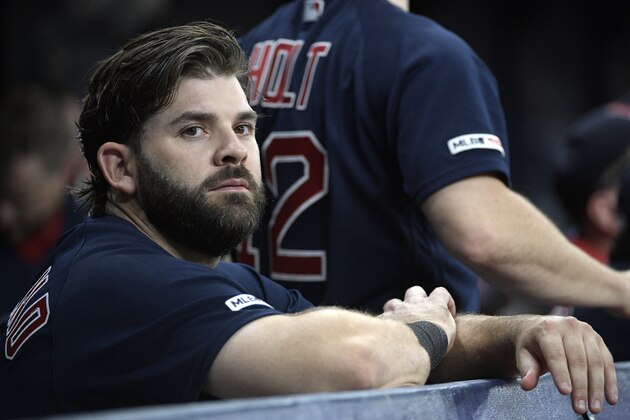 Boston Red Sox first baseman Mitch Moreland watches from the dugout during the tenth inning of a baseball game against the Tampa Bay Rays Friday, Sept. 20, 2019, in St. Petersburg, Fla. (AP Photo/Phelan M. Ebenhack)
