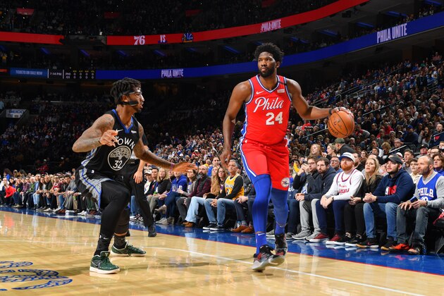 PHILADELPHIA, PA - JANUARY 28: Joel Embiid #21 of the Philadelphia 76ers handles the ball against the Golden State Warriors as he wears #24 in honor of Kobe Bryant on January 28, 2020 at the Wells Fargo Center in Philadelphia, Pennsylvania NOTE TO USER: User expressly acknowledges and agrees that, by downloading and/or using this Photograph, user is consenting to the terms and conditions of the Getty Images License Agreement. Mandatory Copyright Notice: Copyright 2020 NBAE (Photo by Jesse D. Garrabrant/NBAE via Getty Images)