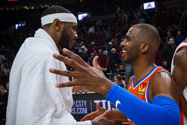 PORTLAND, OR - DECEMBER 8: Carmelo Anthony #00 of the Portland Trail Blazers hugs against Chris Paul #3 of the Oklahoma City Thunder after the game on December 8, 2019 at Moda Center in Portland, Oregon. NOTE TO USER: User expressly acknowledges and agrees that, by downloading and or using this Photograph, User is consenting to the terms and conditions of the Getty Images License Agreement. Mandatory Copyright Notice: Copyright 2019 NBAE (Photo by Zach Beeker/NBAE via Getty Images)