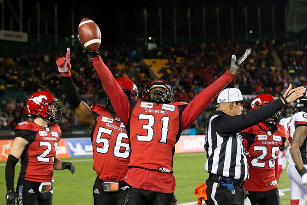 EDMONTON, AB - NOVEMBER 25: Tre Roberson #31 of the Calgary Stampeders celebrates an interception against the Ottawa Redblacks during the second half of the Grey Cup at Commonwealth Stadium on November 25, 2018 in Edmonton, Alberta, Canada. (Photo by Codie McLachlan/Getty Images)