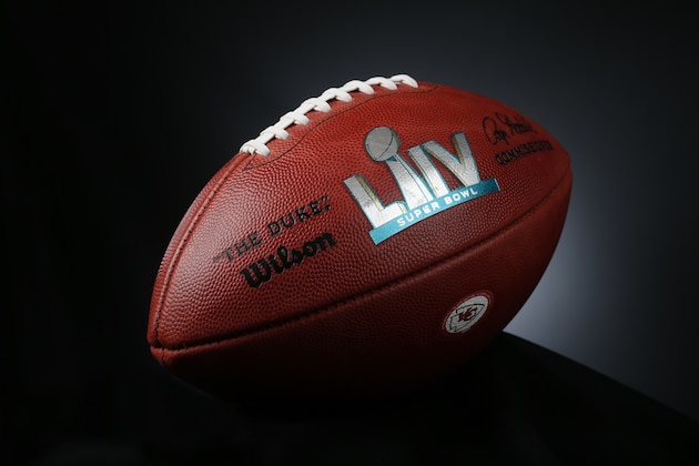 An official ball for the NFL Super Bowl LIV football game with the Kansas City Chiefs logo that was made at the Wilson Sporting Goods Co. in Ada, Ohio, Monday, Jan. 20, 2020. The Kansas City Chiefs will play the San Francisco 49ers in the Super Bowl LIV on Feb. 2, in Miami. (AP Photo/Ron Schwane)