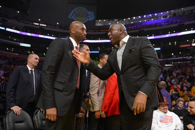 LOS ANGELES, CA - OCTOBER 25: Former Los Angeles Lakers Kobe Bryant, left and Earvin Magic Johnson, president of basketball operations of the Lakers talk during the game between the Los Angeles Lakers and the Denver Nuggets on October 25, 2018 at STAPLES Center in Los Angeles, California. NOTE TO USER: User expressly acknowledges and agrees that, by downloading and or using this photograph, User is consenting to the terms and conditions of the Getty Images License Agreement. (Photo by Robert Laberge/Getty Images) LOS ANGELES, CA - OCTOBER 25: Former Los Angeles Lakers Kobe Bryant, left and Earvin Magic Johnson, president of basketball operations of the Lakers talk during the game between the Los Angeles Lakers and the Denver Nuggets on October 25, 2018 at STAPLES Center in Los Angeles, California. NOTE TO USER: User expressly acknowledges and agrees that, by downloading and or using this photograph, User is consenting to the terms and conditions of the Getty Images License Agreement. (Photo by Robert Laberge/Getty Images)