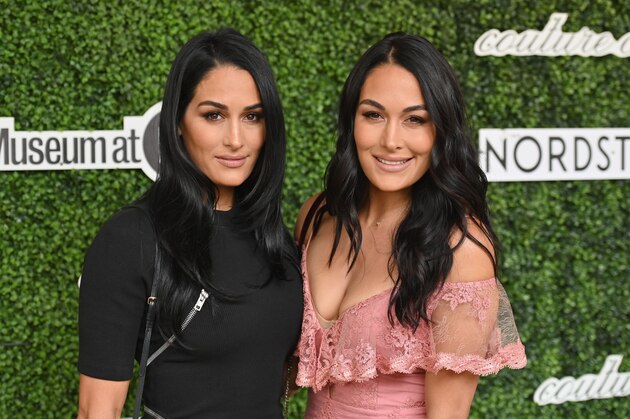 Professional wrestlers Brie and Nikki Bella aka 'The Bella Twins' attend the 2019 Couture Council Award Luncheon honoring French iconic footwear designer Christian Louboutin at the David H. Koch Theater on September 04, 2019 in New York City. (Photo by Angela Weiss / AFP)        (Photo credit should read ANGELA WEISS/AFP via Getty Images)