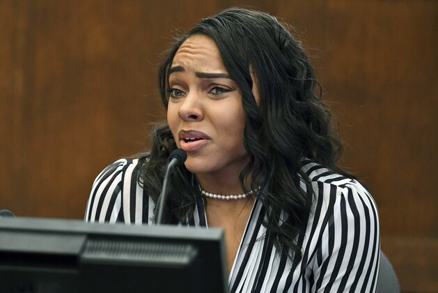 Shayanna Jenkins-Hernandez, fiancee of former New England Patriots player Aaron Hernandez, testifies in Suffolk Superior Court during his trial for the July 2012 killings of Daniel de Abreu and Safiro Furtado, on Thursday, March 30, 2017, in Boston. Hernandez is already serving a life sentence in the 2013 killing of semi-professional football player Odin Lloyd. (Josh Reynolds /The Boston Globe via AP, Pool)