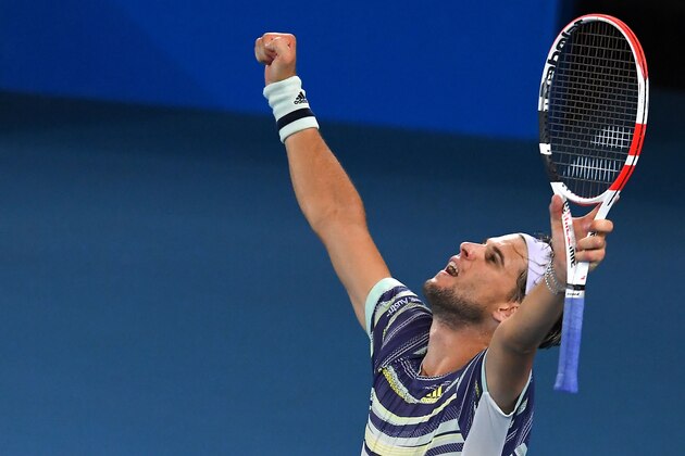 Austria's Dominic Thiem celebrates after victory against Spain's Rafael Nadal during their men's singles quarter-final match on day ten of the Australian Open tennis tournament in Melbourne on January 30, 2020. (Photo by Greg Wood / AFP) / IMAGE RESTRICTED TO EDITORIAL USE - STRICTLY NO COMMERCIAL USE (Photo by GREG WOOD/AFP via Getty Images) Austria's Dominic Thiem celebrates after victory against Spain's Rafael Nadal during their men's singles quarter-final match on day ten of the Australian Open tennis tournament in Melbourne on January 30, 2020. (Photo by Greg Wood / AFP) / IMAGE RESTRICTED TO EDITORIAL USE - STRICTLY NO COMMERCIAL USE (Photo by GREG WOOD/AFP via Getty Images)