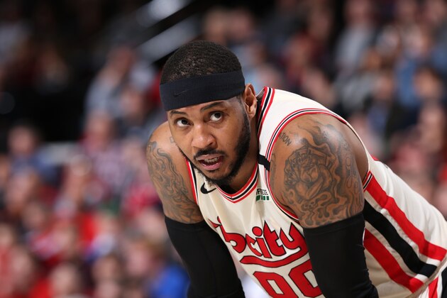 PORTLAND, OR - JANUARY 23: Carmelo Anthony #00 of the Portland Trail Blazers looks on during the game against the Dallas Mavericks on January 23, 2020 at the Moda Center Arena in Portland, Oregon. NOTE TO USER: User expressly acknowledges and agrees that, by downloading and or using this photograph, user is consenting to the terms and conditions of the Getty Images License Agreement. Mandatory Copyright Notice: Copyright 2020 NBAE (Photo by Sam Forencich/NBAE via Getty Images)