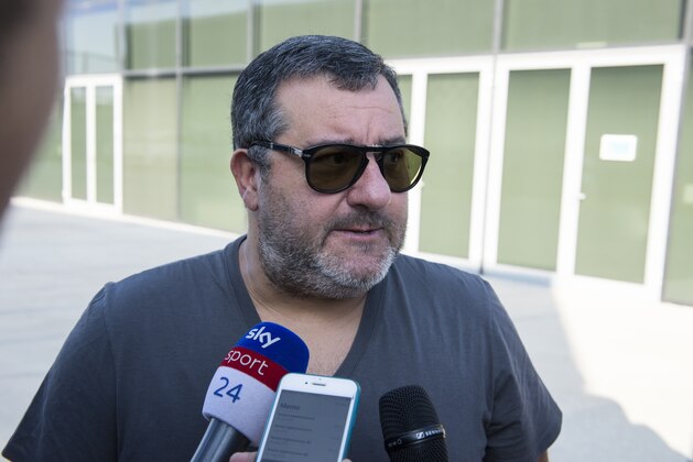 TURIN, ITALY - JULY 17: Agent Mino Raiola accompanies Matthijs De Ligt as he arrives in Turin ahead of his signing with Juventus FC on July 17, 2019 in Turin, Italy. (Photo by Stefano Guidi/Getty Images)