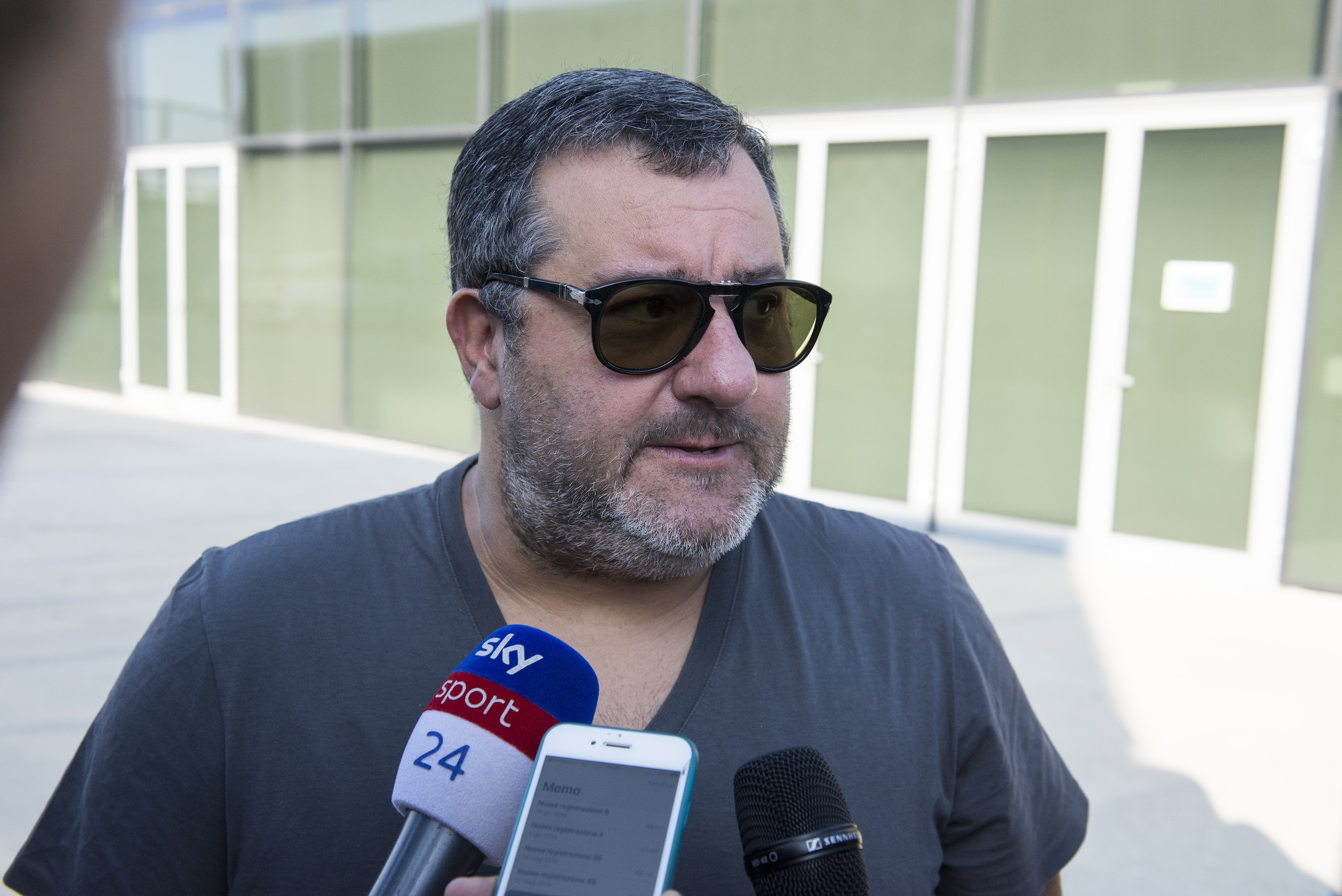TURIN, ITALY - JULY 17: Agent Mino Raiola accompanies Matthijs De Ligt as he arrives in Turin ahead of his signing with Juventus FC on July 17, 2019 in Turin, Italy. (Photo by Stefano Guidi/Getty Images)