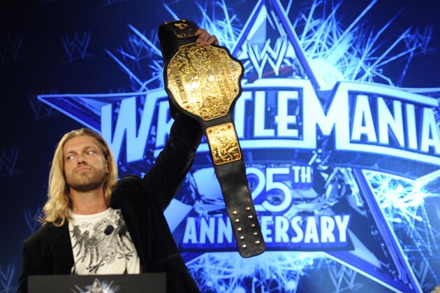 WWE (World Wrestling Entertainment) World Heavyweight Champion Edge and Chris Jericho (R)  during a press conference in New York March 31, 2009 to promote the 25th Anniversary of WrestleMania to take place at Reliant Stadium in Houston, Texas on April 5th.  AFP PHOTO/ TIMOTHY A. CLARY (Photo credit should read TIMOTHY A. CLARY/AFP via Getty Images)