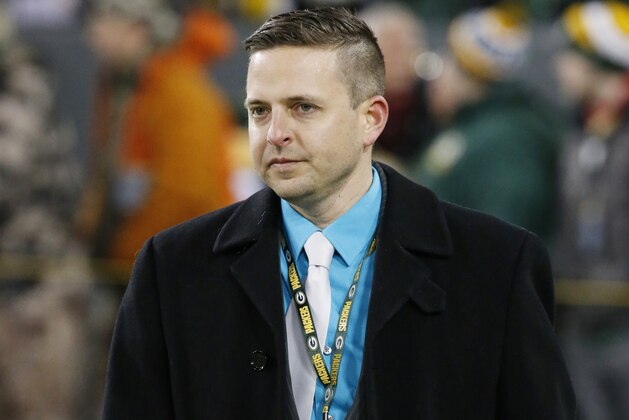 Green Bay Packers Eliot Wolf walks on the field before an NFL football game against the Minnesota Vikings Sunday, Jan. 3, 2016, in Green Bay, Wis. (AP Photo/Mike Roemer)