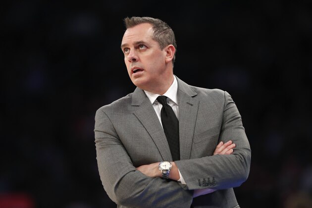 Los Angeles Lakers head coach Frank Vogel watches a replay on a giant video screen above the court during an officials' time out in the second half of an NBA basketball game in New York, Wednesday, Jan. 22, 2020. The Lakers defeated the Knicks 100-92. (AP Photo/Kathy Willens)