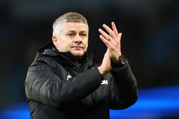 MANCHESTER, ENGLAND - JANUARY 29:  Ole Gunnar Solskjaer the manager of Manchester United applauds their support after the Carabao Cup Semi Final match between Manchester City and Manchester United at Etihad Stadium on January 29, 2020 in Manchester, England. (Photo by Alex Livesey - Danehouse/Getty Images)