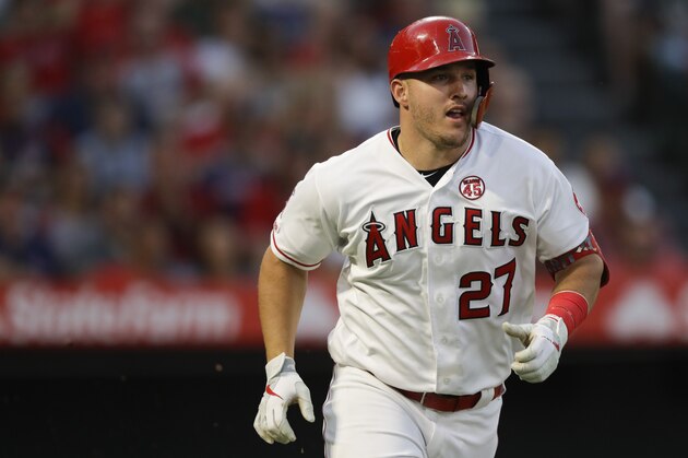 Los Angeles Angels' Mike Trout runs to first during a baseball game against the Boston Red Sox in Anaheim, Calif., Saturday, Aug. 31, 2019. (AP Photo/Chris Carlson)