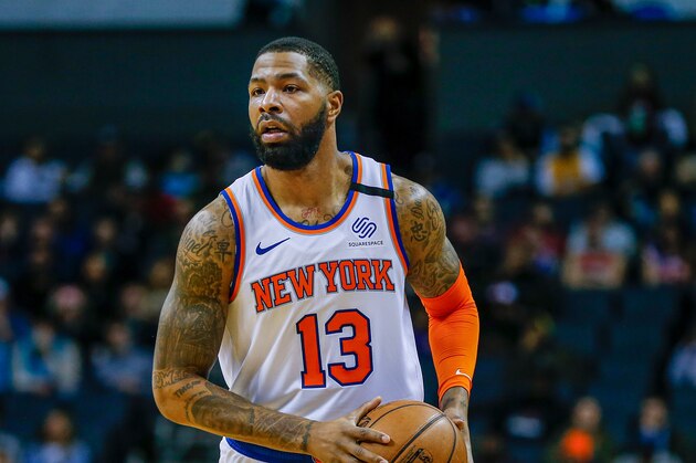 New York Knicks forward Marcus Morris Sr. brings the ball up court against the Charlotte Hornets in the second half of an NBA basketball game in Charlotte, N.C., Tuesday, Jan. 28, 2020. Charlotte won 97-92. (AP Photo/Nell Redmond)