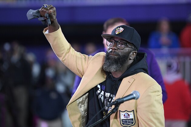 Former Baltimore Ravens safety Ed Reed displays his Pro Football Hall of Fame ring during a ceremony at halftime of an NFL football game between the Baltimore Ravens and the New England Patriots, Sunday, Nov. 3, 2019, in Baltimore. (AP Photo/Nick Wass)