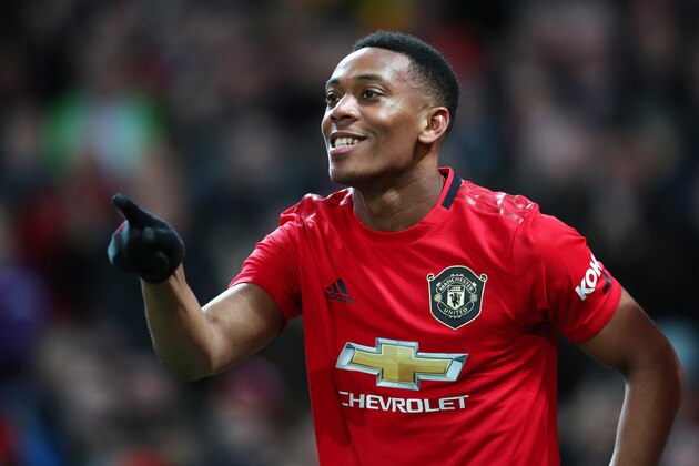MANCHESTER, ENGLAND - JANUARY 11: Anthony Martial of Manchester United celebrates after scoring his team's third goal during the Premier League match between Manchester United and Norwich City at Old Trafford on January 11, 2020 in Manchester, United Kingdom. (Photo by Catherine Ivill/Getty Images)