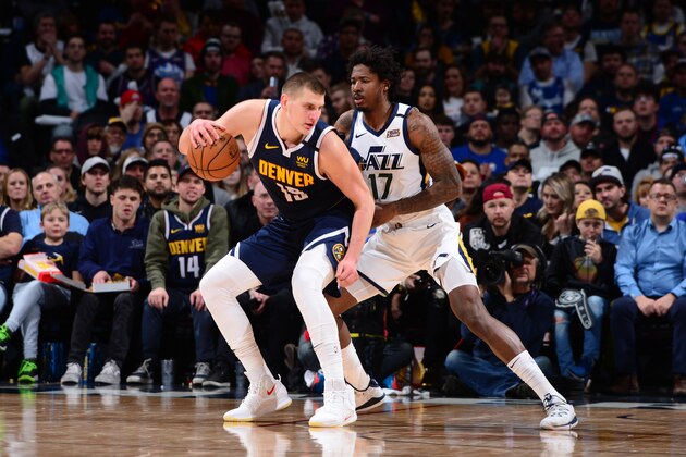DENVER, CO - JANUARY 30: Nikola Jokic #15 of the Denver Nuggets handles the ball against the Utah Jazz on January 30, 2020 at the Pepsi Center in Denver, Colorado. NOTE TO USER: User expressly acknowledges and agrees that, by downloading and/or using this Photograph, user is consenting to the terms and conditions of the Getty Images License Agreement. Mandatory Copyright Notice: Copyright 2020 NBAE (Photo by Bart Young/NBAE via Getty Images)
