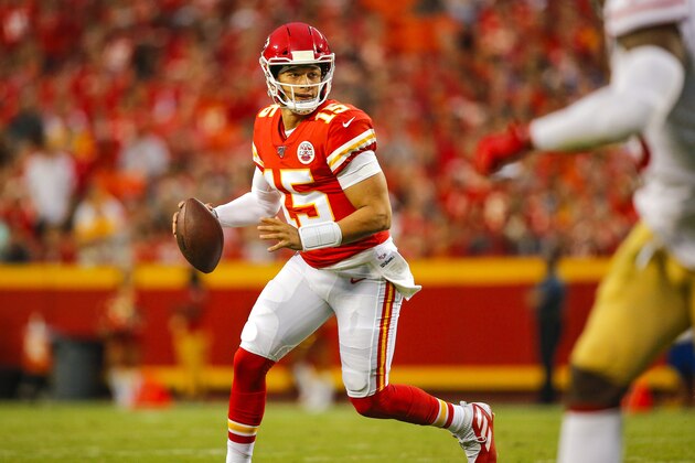KANSAS CITY, MO - AUGUST 24: Patrick Mahomes #15 of the Kansas City Chiefs looks for an open receiver in preseason game action against the San Francisco 49ers at Arrowhead Stadium on August 24, 2019 in Kansas City, Missouri. (Photo by David Eulitt/Getty Images)
