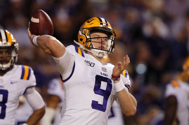 LSU quarterback Joe Burrow (9) warms up before an NCAA college football game against Texas A&M in Baton Rouge, La., Saturday, Nov. 30, 2019. (AP Photo/Gerald Herbert)