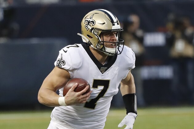 New Orleans Saints' Taysom Hill carries the ball during the second half of an NFL football game against the Chicago Bears in Chicago, Sunday, Oct. 20, 2019. (AP Photo/Charles Rex Arbogast)